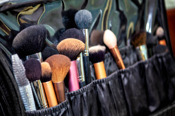 istock Many makeup brushes in bag. Beauty background concept. 1217202655