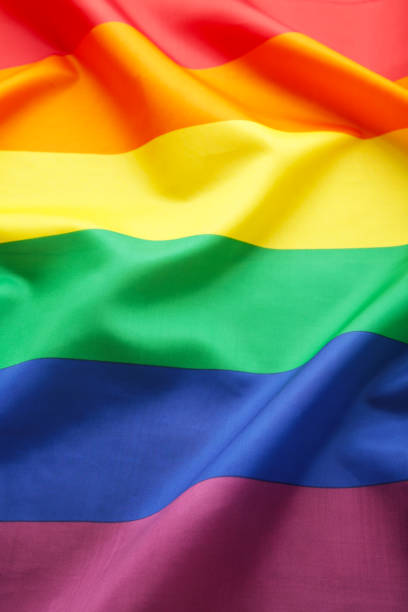istock A rainbow flag background with copy space. Vertical foto 1217203353