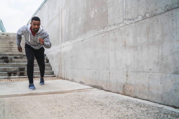 istock Portrait of an athletic man running. 1217207327
