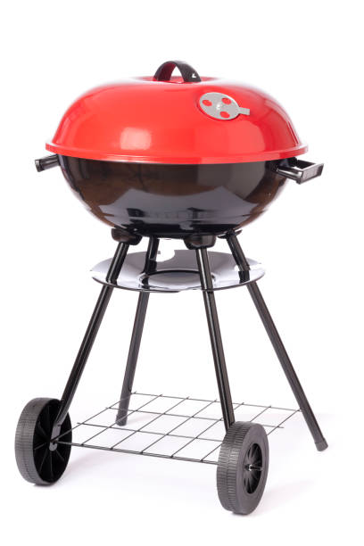 Barbecue Grill Red and Black Generic Barbecue Grill with Four Black Legs. metal grate stock pictures, royalty-free photos & images