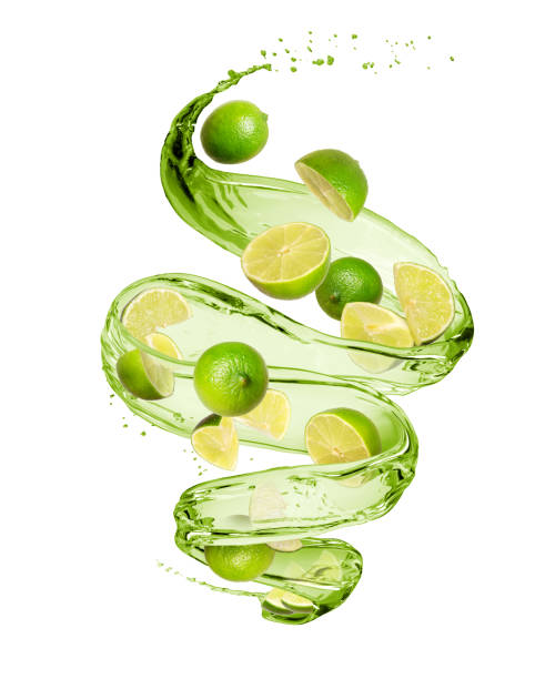 istock Lime with splashes of juice in a swirling shape, isolated on white background 1217210530