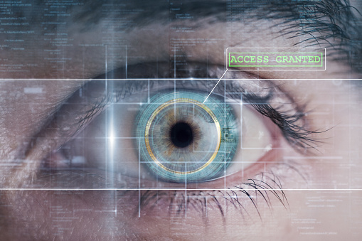 Human being futuristic vision, vision and control and protection of persons, control and security in the accesses. surveillance system, blue eyes, green eyes, future, hologram, man, guy, internet.