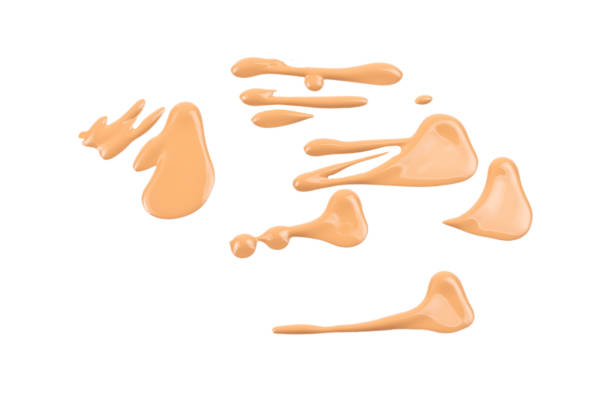 istock Liquid foundation swatch isolated on white background. Close Up of makeup cream sample. 1217217340
