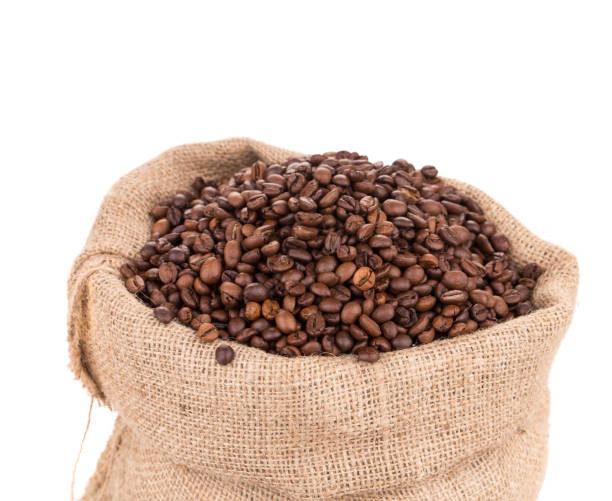 istock Coffee beans in burlap sack. 1217218038