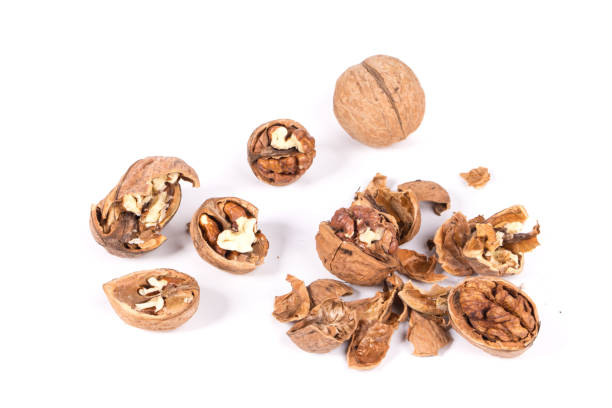 istock Heap of cracked walnuts. 1217218172