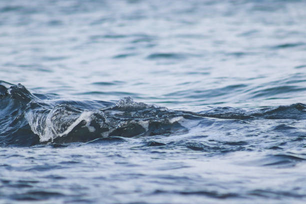 istock Beautiful   blue sea water surface with low waves. Seascape background. 1217224034