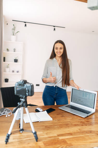 istock Young woman records video lessons on camera 1217224278