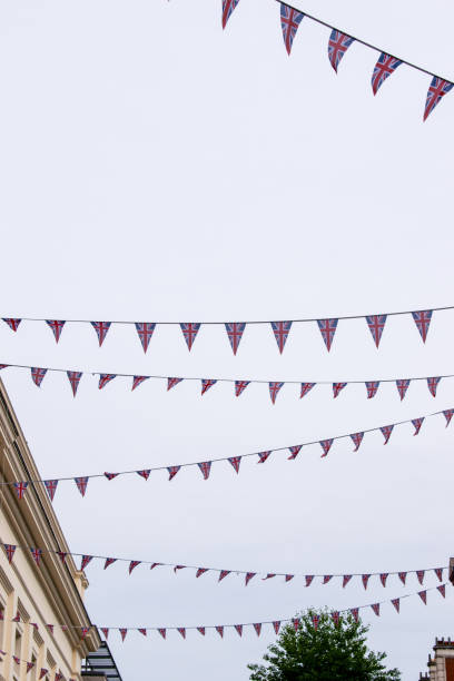 istock Union Jack bunting against grey sky, London, UK. 1217224463