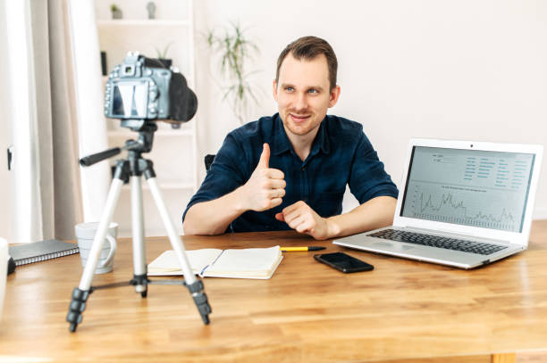 istock Young man teaches and records video lessons 1217224535