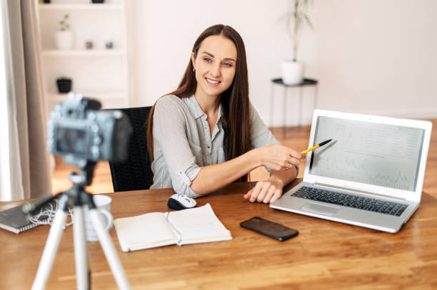 istock Young woman teaches and records video lessons 1217224579
