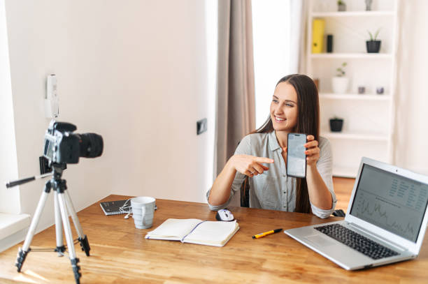 istock Young woman teaches and records video lessons 1217224614