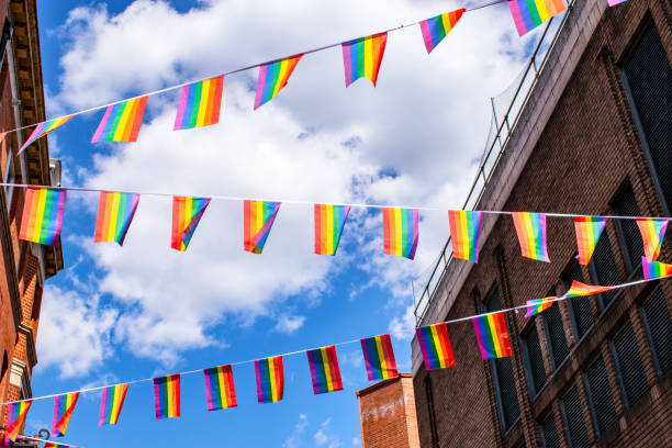 istock Pride flags against blue sky in Chinatown, London, UK 1217224635