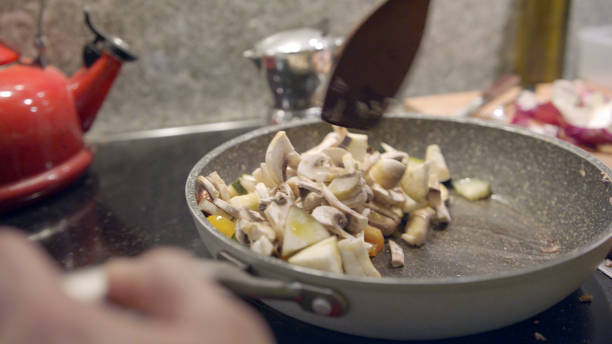istock View of chef cooking vegetarian meal 1217225943