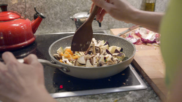 istock Female chef cooks vegetarian meal 1217225959