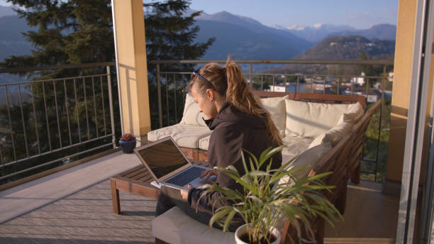 istock Young woman works from home office computer 1217226051