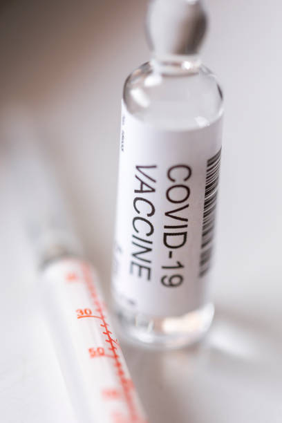 istock Covid-19 vaccine vial and syringe 1217229606