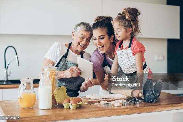 Were Trying Anew Recipe Stock Photo - Download Image Now - Mother, Grandmother, Cooking