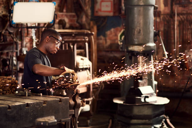 istock Sparks fly when metal melts 1217231825