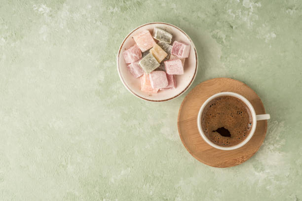 istock Turkish delight and coffee on green with copy space 1217231904