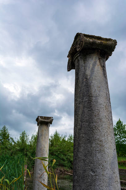 Ancient column ruins in the Dion Archaeological Site at Greece Ancient column ruins in the Dion Archaeological Site at Greece. katerini greece photos stock pictures, royalty-free photos & images