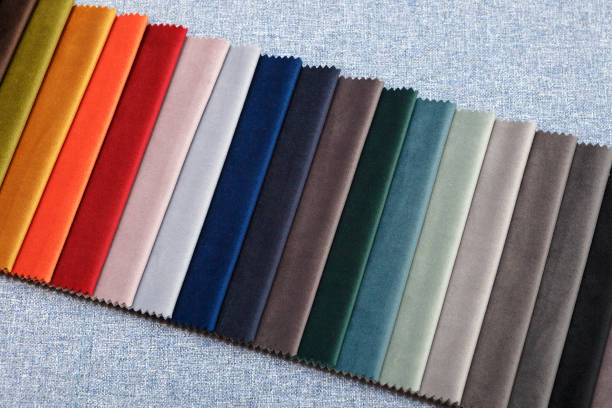 Multi-colored samples of upholstery fabric for sofas and chairs close-up.