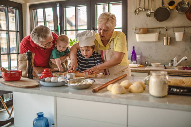 istock Grandparents cooking with kids 1217232983