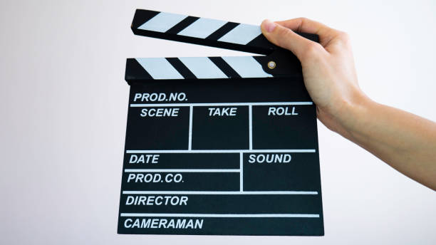 istock Close up clapperboard in hands. Cinematography production concept. 1217234046