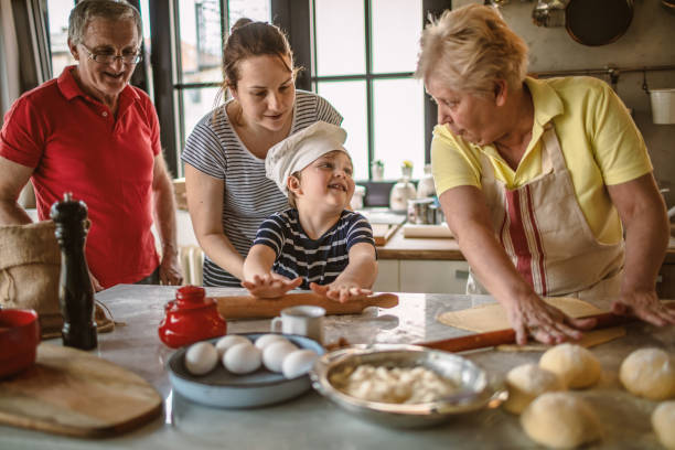 istock Multigeneration Family cooking together 1217236466