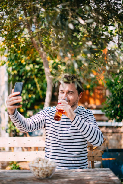 istock Man Making a Video Call in the Garden 1217240937