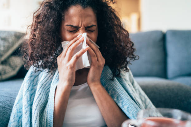 istock Sick woman with flu 1217241163