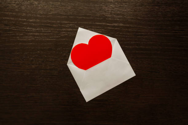 A heart cut out in an envelope