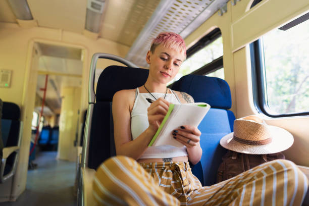 istock Plenty of time on train trip to write down your thoughts 1217246839