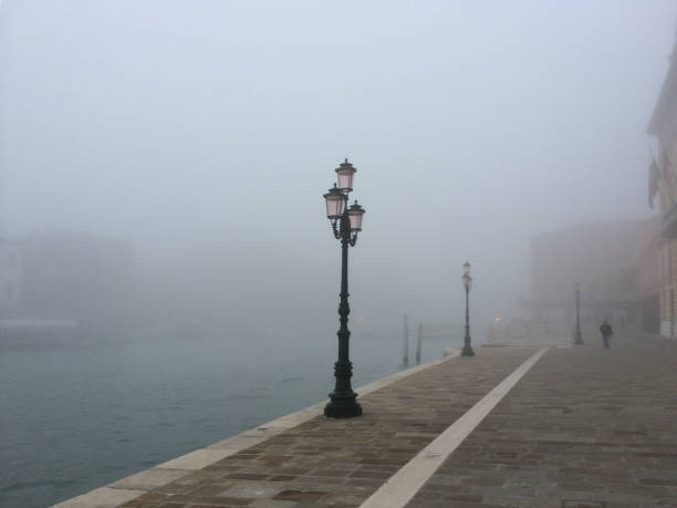 istock Foggy day in Venice, early morning mist 1217247233
