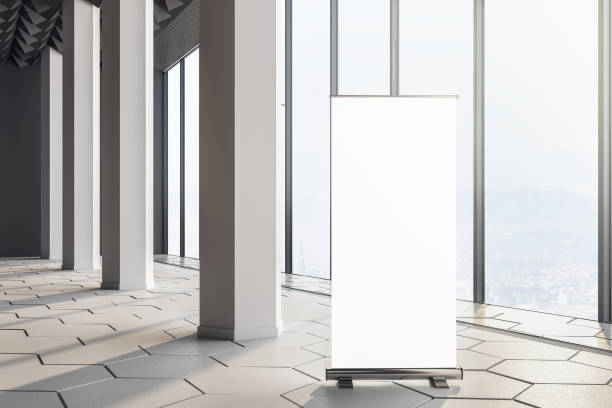 istock Contemporary concrete interior room with columns and blank banner. 1217248733