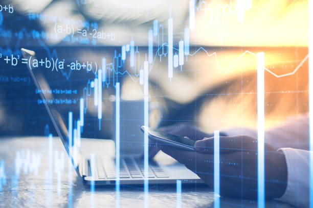 istock Hand using smartphone with abstract business chart hologram. 1217249746