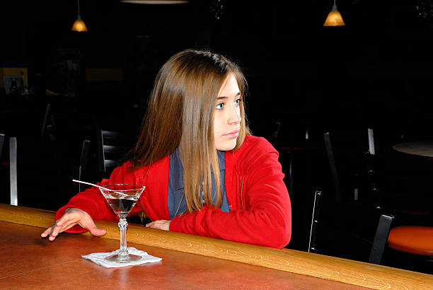 Sneaking a Drink stock photo