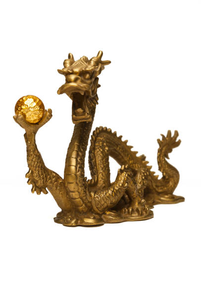 istock Chinese dragon with golden sphere 1217250661