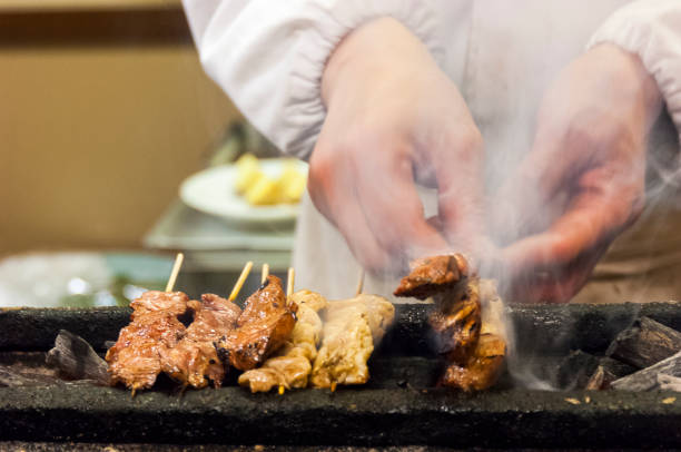 ヤキトン豚串 - 焼き鳥 japanese culture spit roasted 日本食 ストックフォトと画像