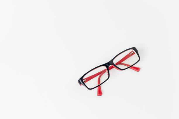 istock Modern eyeglass isolated on white background. single black and red eyeglasses.Glasses on white background image for background, objects and copy space. 1217255199