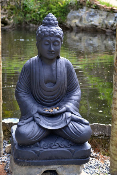 istock Buddha statue in meditation 1217256999