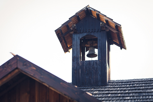 Old church wooden bell tower against sky
