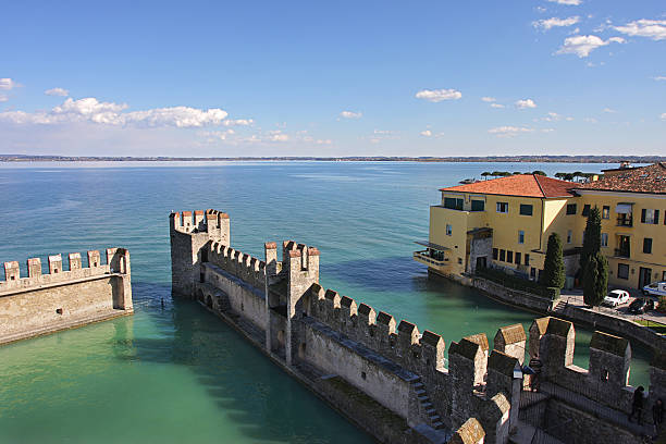 istock View on Lake Garda and ancient fortification. 121725978