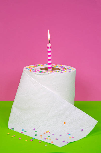 istock birthday candle in white toilet paper roll 1217262806