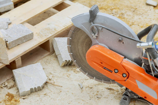 Concrete cutting with saw blade at construction site Concrete cutting with saw blade at construction at reconstruction area. Closeup razor blade stock pictures, royalty-free photos & images