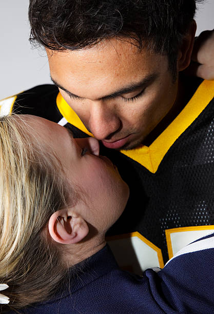 Football Player and Cheerleader