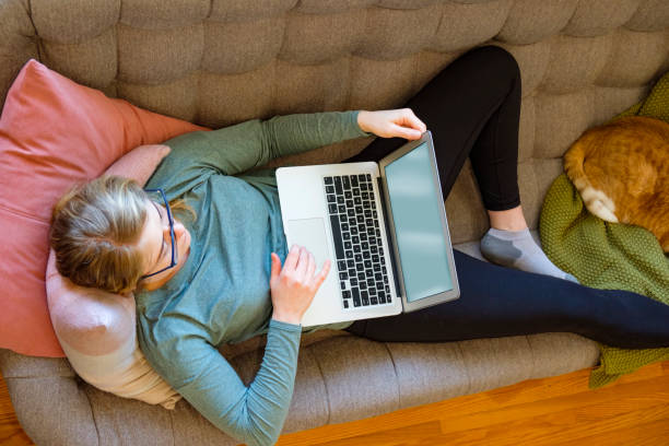 istock Young Woman Reading Her Laptop 1217264866