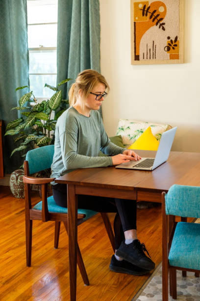 istock Young Woman Working From Home 1217264967