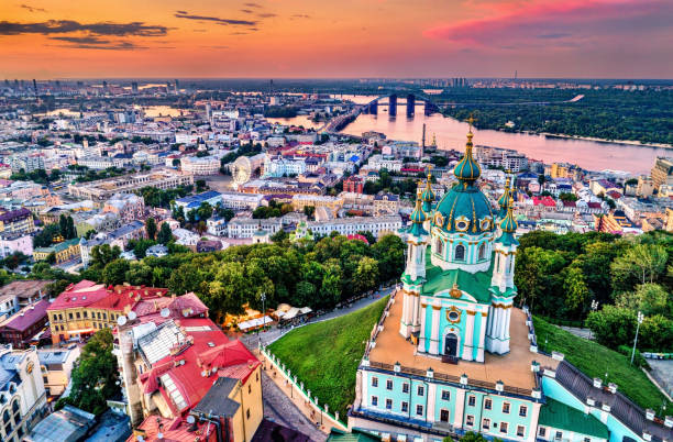 Saint Andrew church and Podil in Kiev, Ukraine Saint Andrew church and Podil neighborhood in the old town of Kiev, Ukraine kyiv stock pictures, royalty-free photos & images