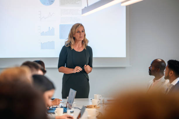 istock Corporate Professional Making Presentation to Colleagues 1217267523