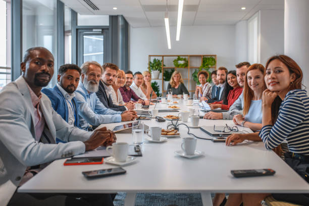 istock Full Complement of Executives at Management Meeting 1217268078